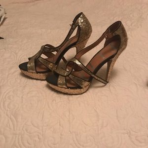Black and gold heels